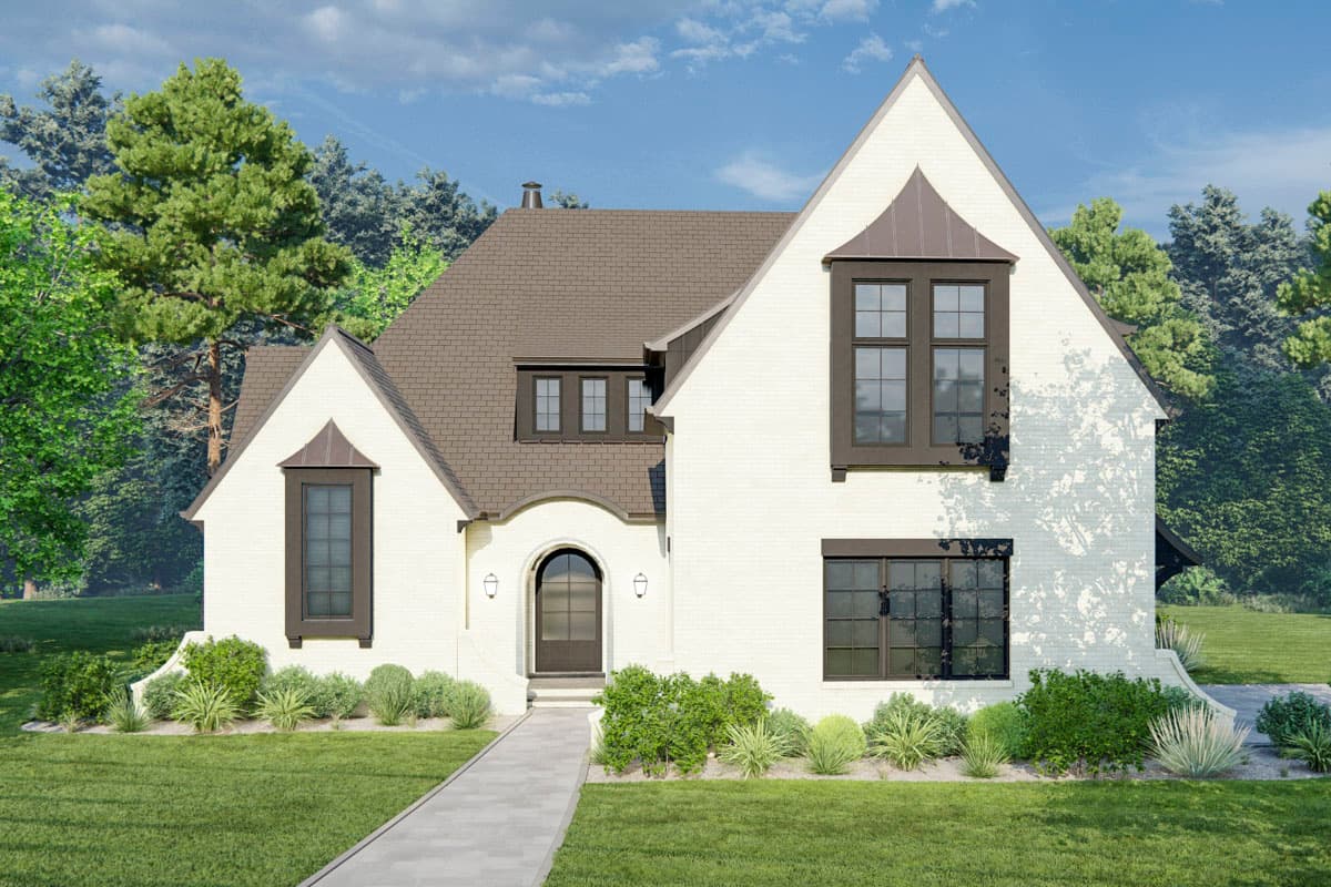 House plan exterior: White brick two-story with gables, arched entryway, and dark-framed windows.