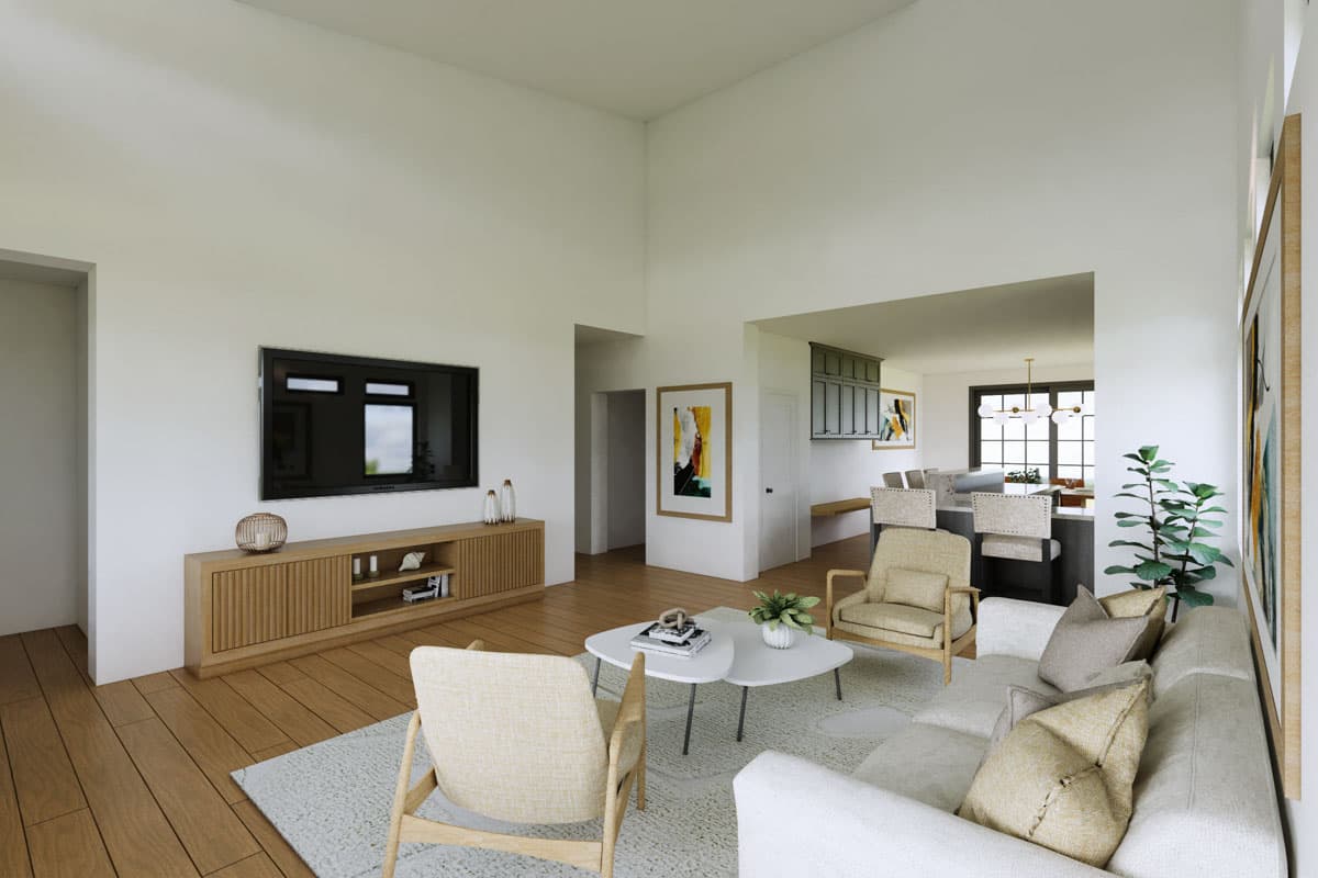 Interior rendering of a great room with high ceilings, television, and open view to a kitchen with island and bar stools.