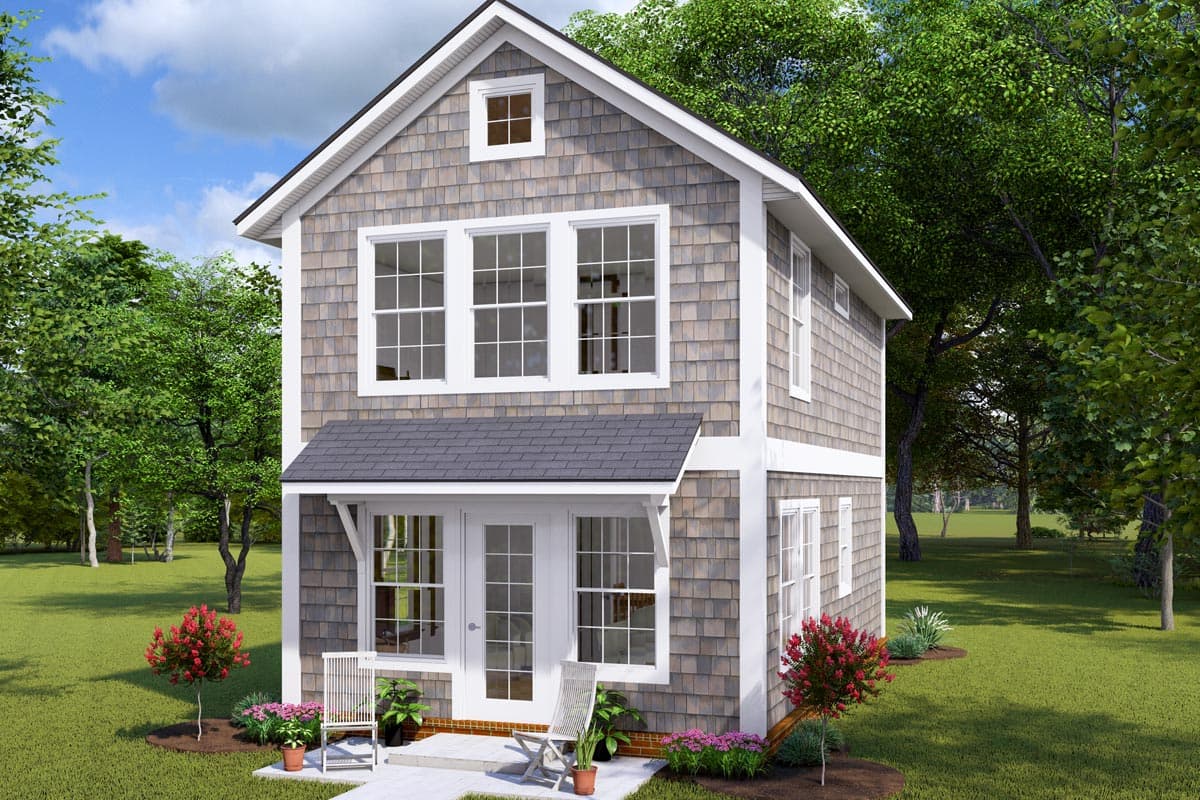 House plan exterior: Two-story home with shingle siding, prominent gable, and dormer window.