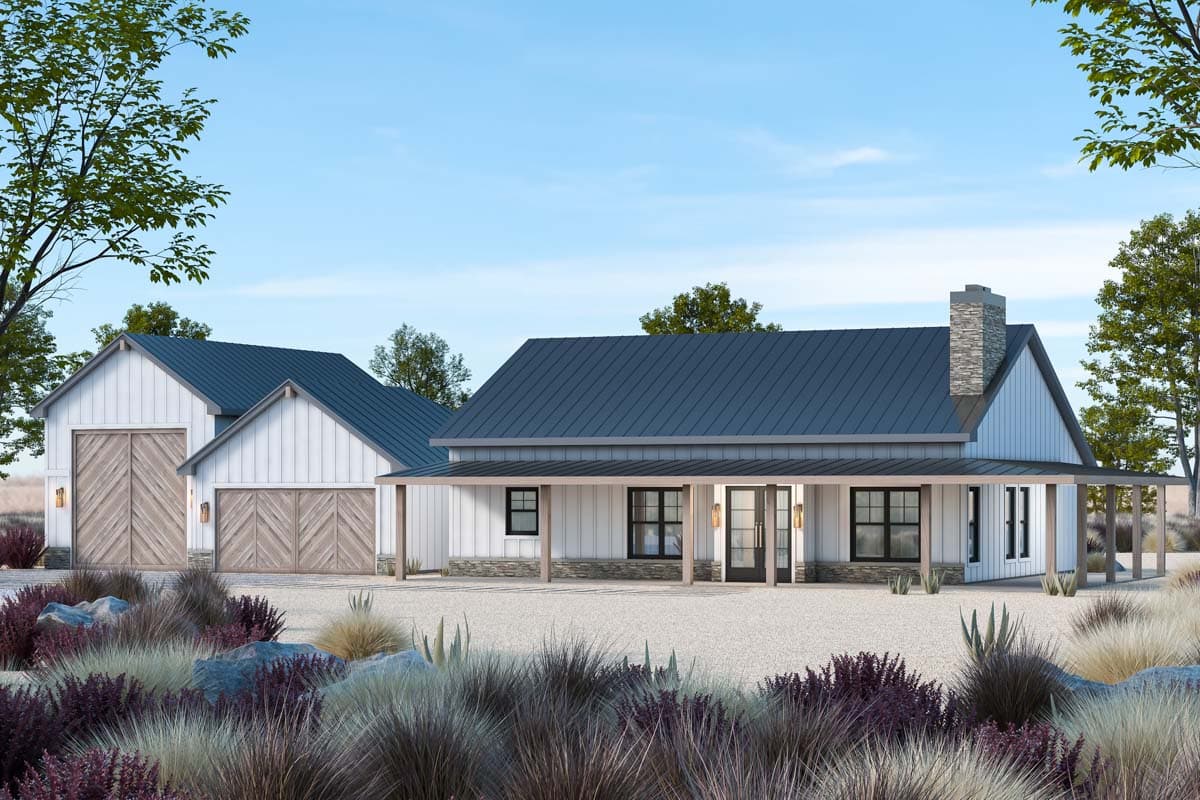 Modern farmhouse house plan exterior with a covered porch, stone accents, metal roof, and a detached garage.