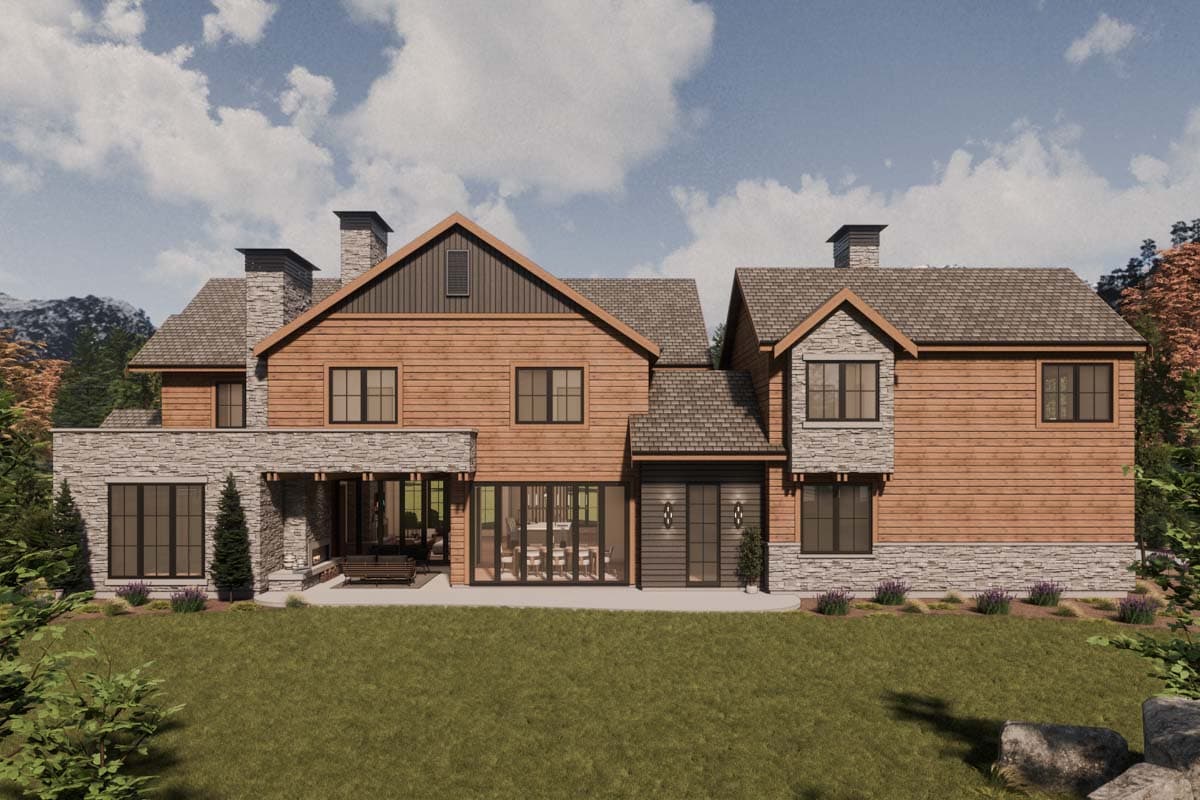 House plan exterior with stone and wood siding, multiple gables, dormers, and chimneys.