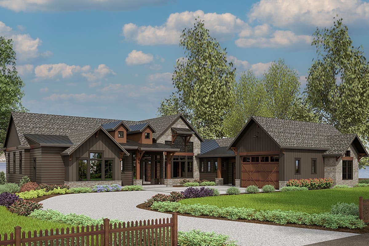 House plan exterior. Craftsman style with a single story, multiple gables, exposed rafter tails, and a detached garage.