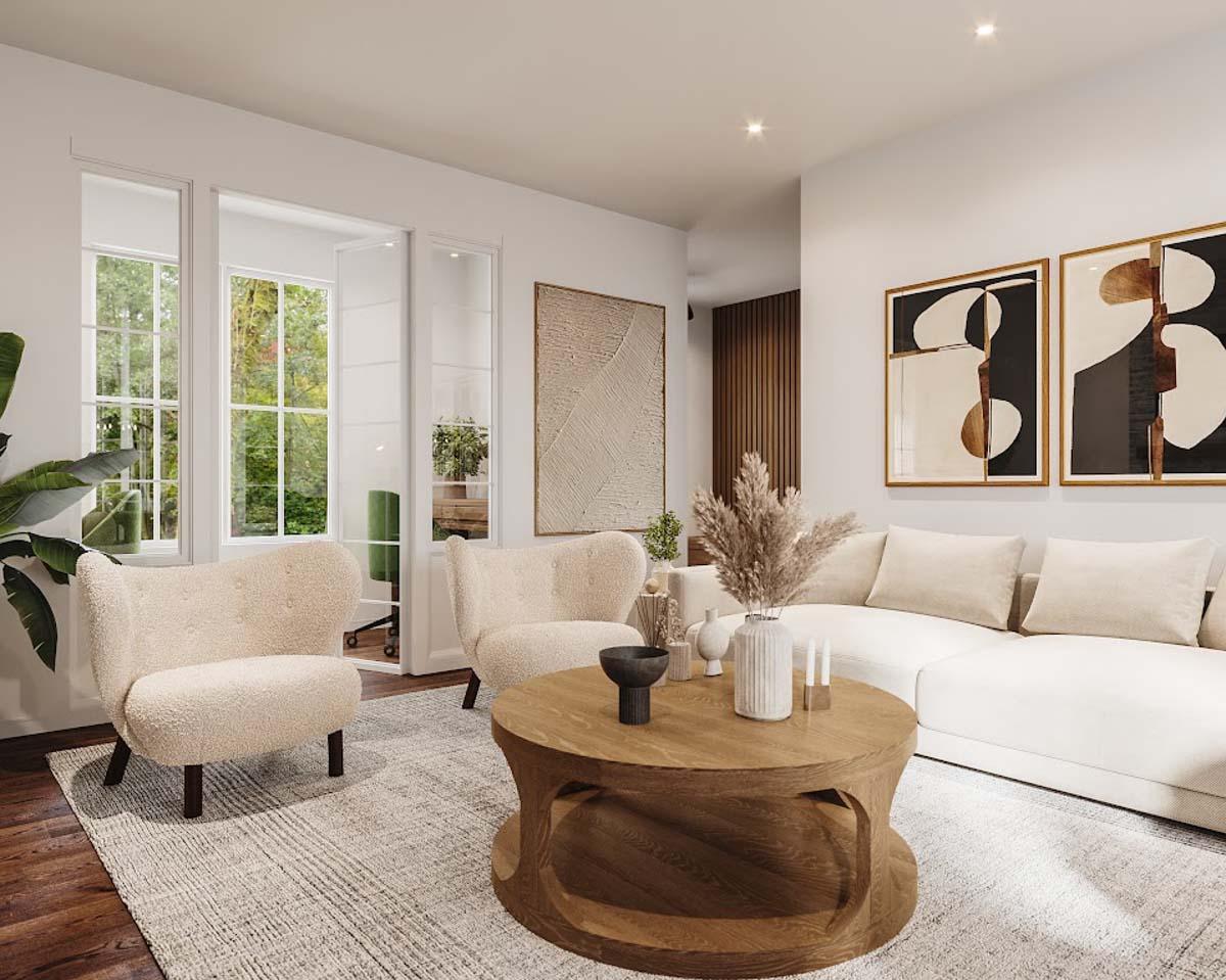 Modern living room with neutral colors. Features two fluffy chairs, white couch, wooden coffee table with decor, and abstract art.