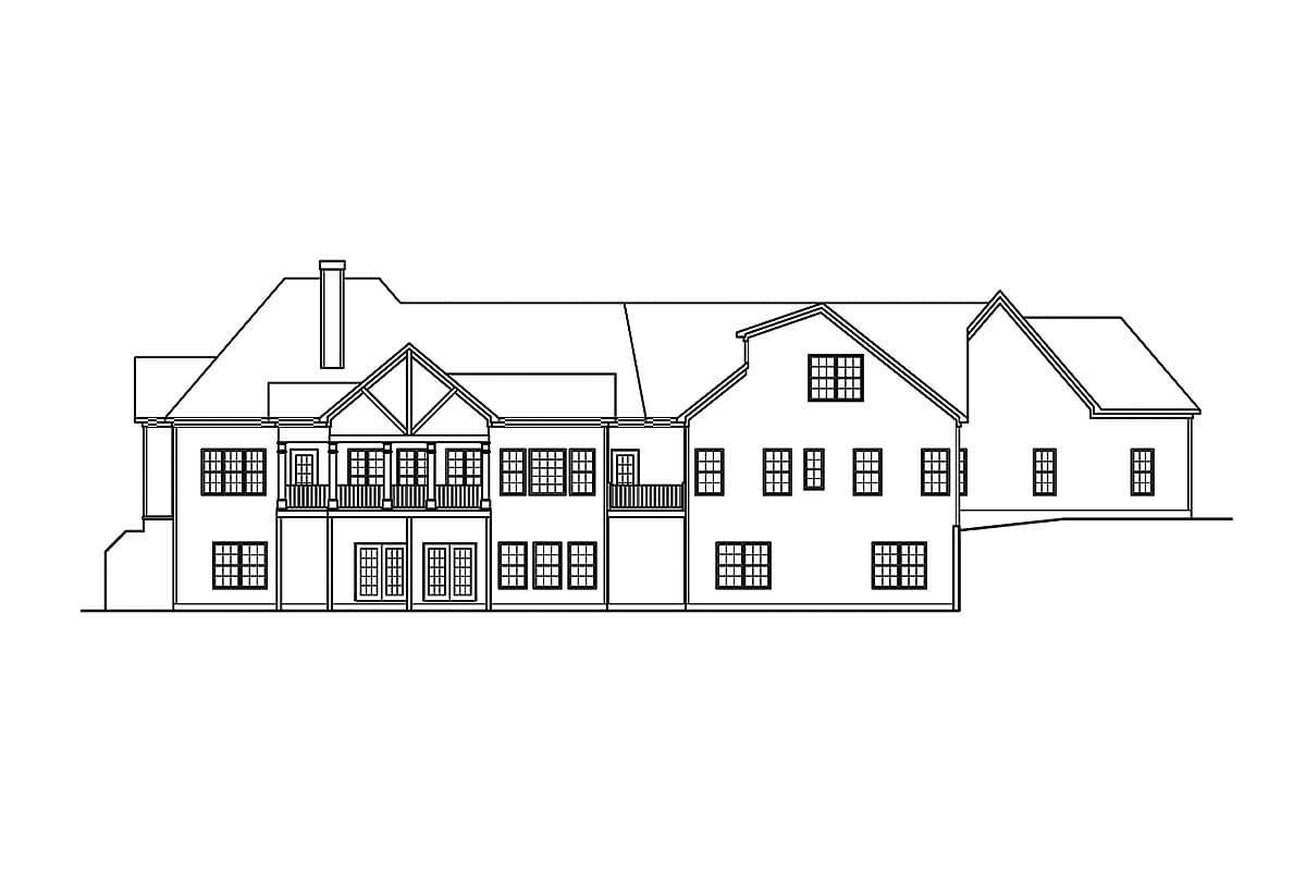 House plan exterior featuring multiple gables, a prominent chimney, second-story balconies, and numerous grid windows.