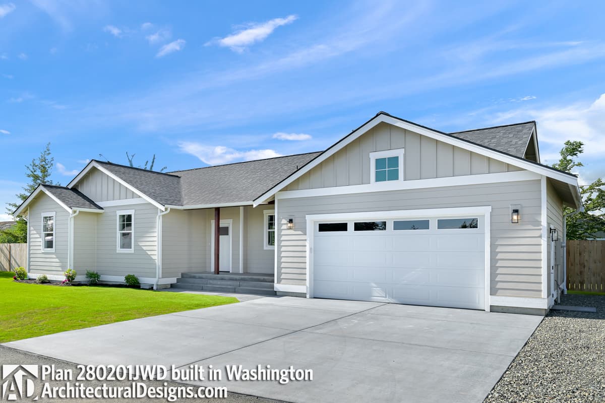 Ranch style house plan exterior with a 2-car garage, gabled dormer, and covered entry porch.