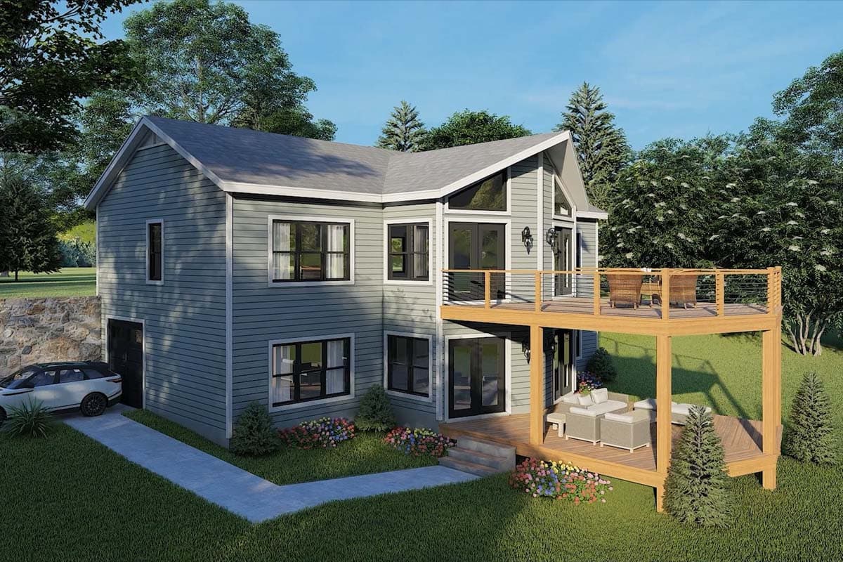 House plan exterior: Two-story modern home with attached garage, large deck, and prominent gable dormer with multiple windows.