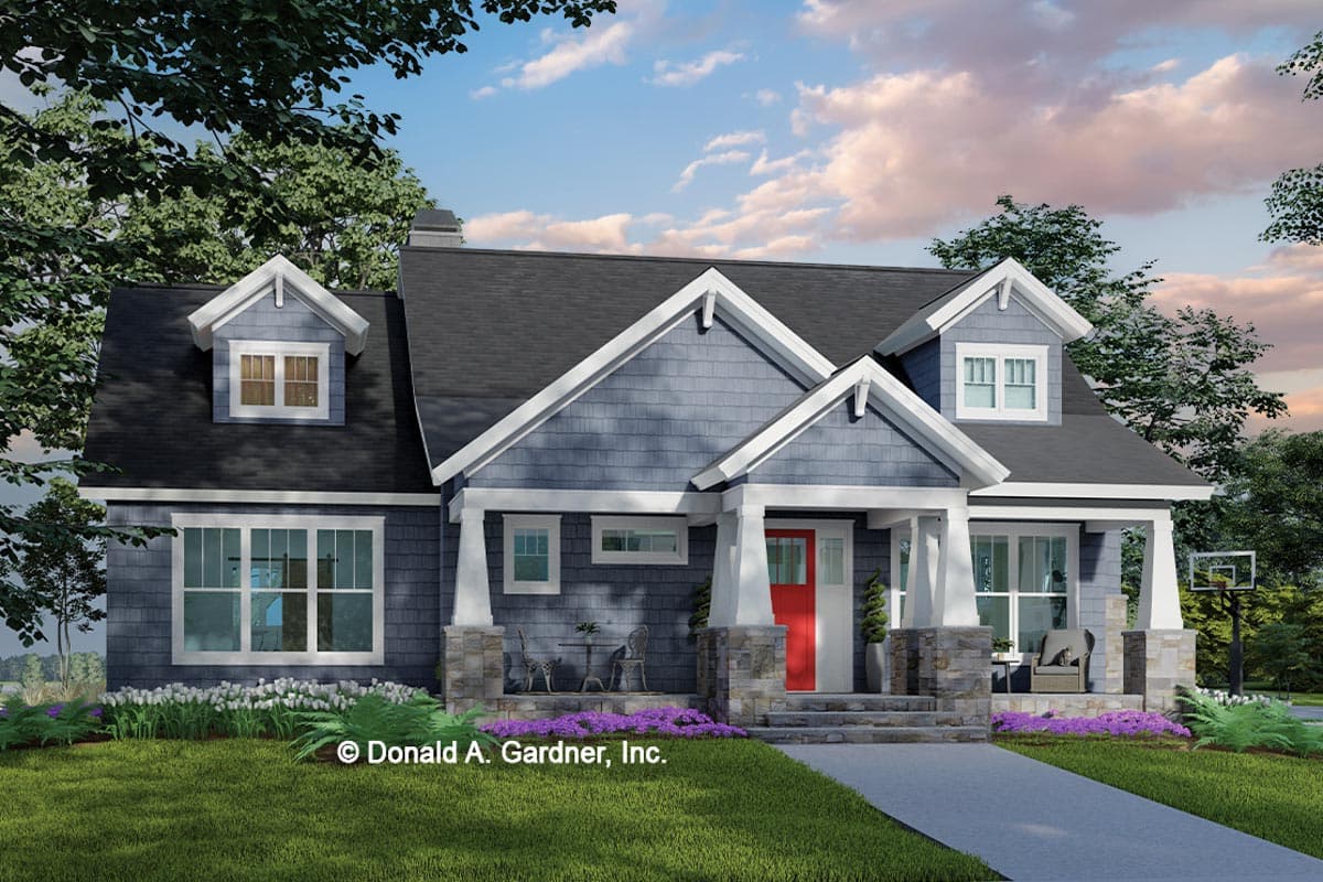 House plan exterior. Craftsman style, two-story house with gables, dormers, and a covered porch. Features stone accents and a prominent roofline.