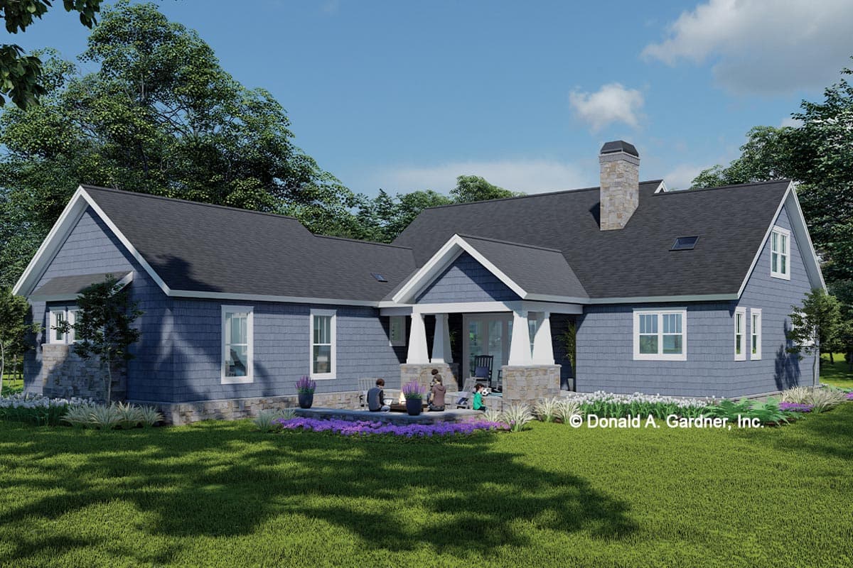 House plan exterior: Ranch style, blue shake siding, stone accents, covered entry porch with stone supports, and chimney.