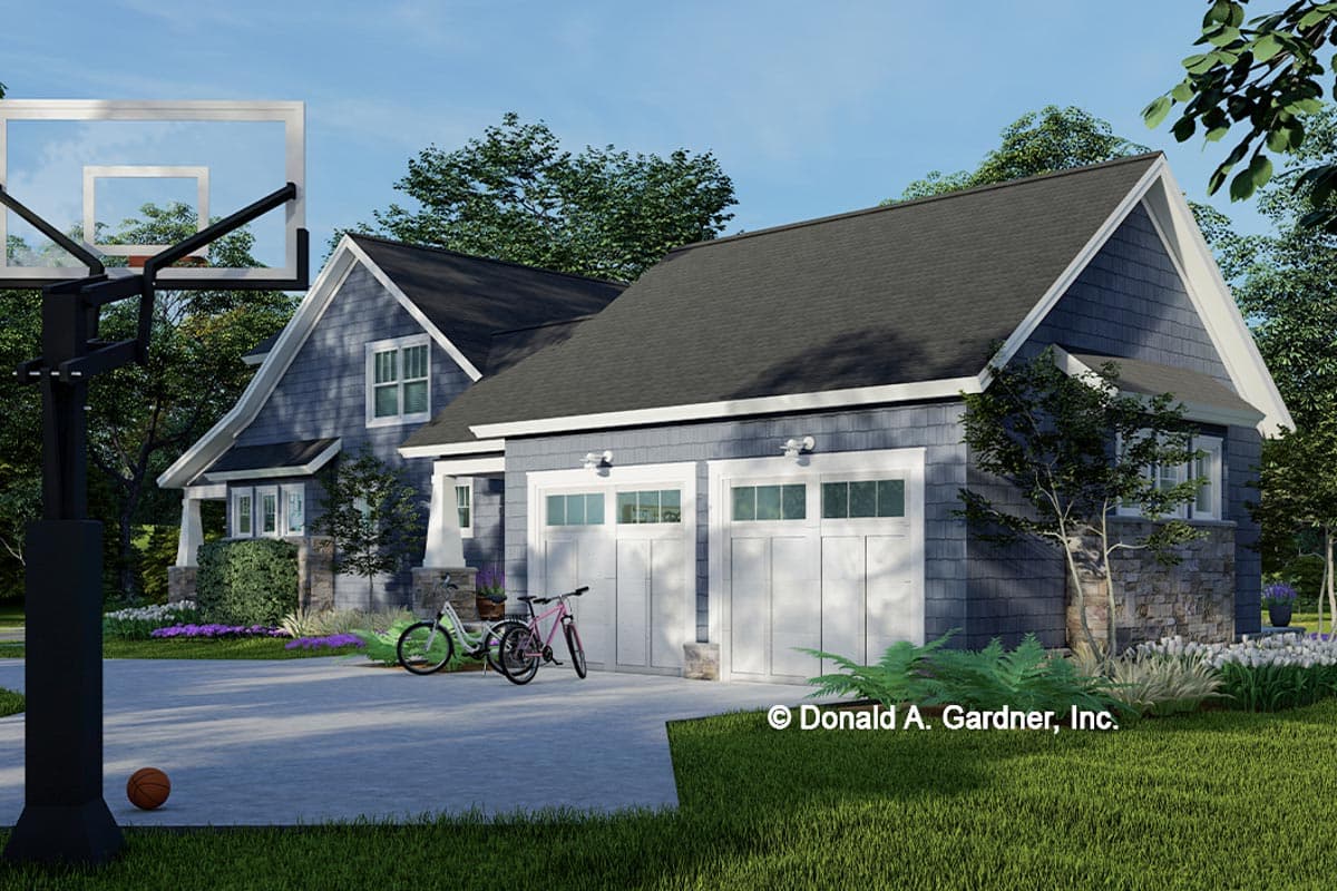 Craftsman style house plan exterior with two-car garage, shingle siding, stone accents, and prominent gables.