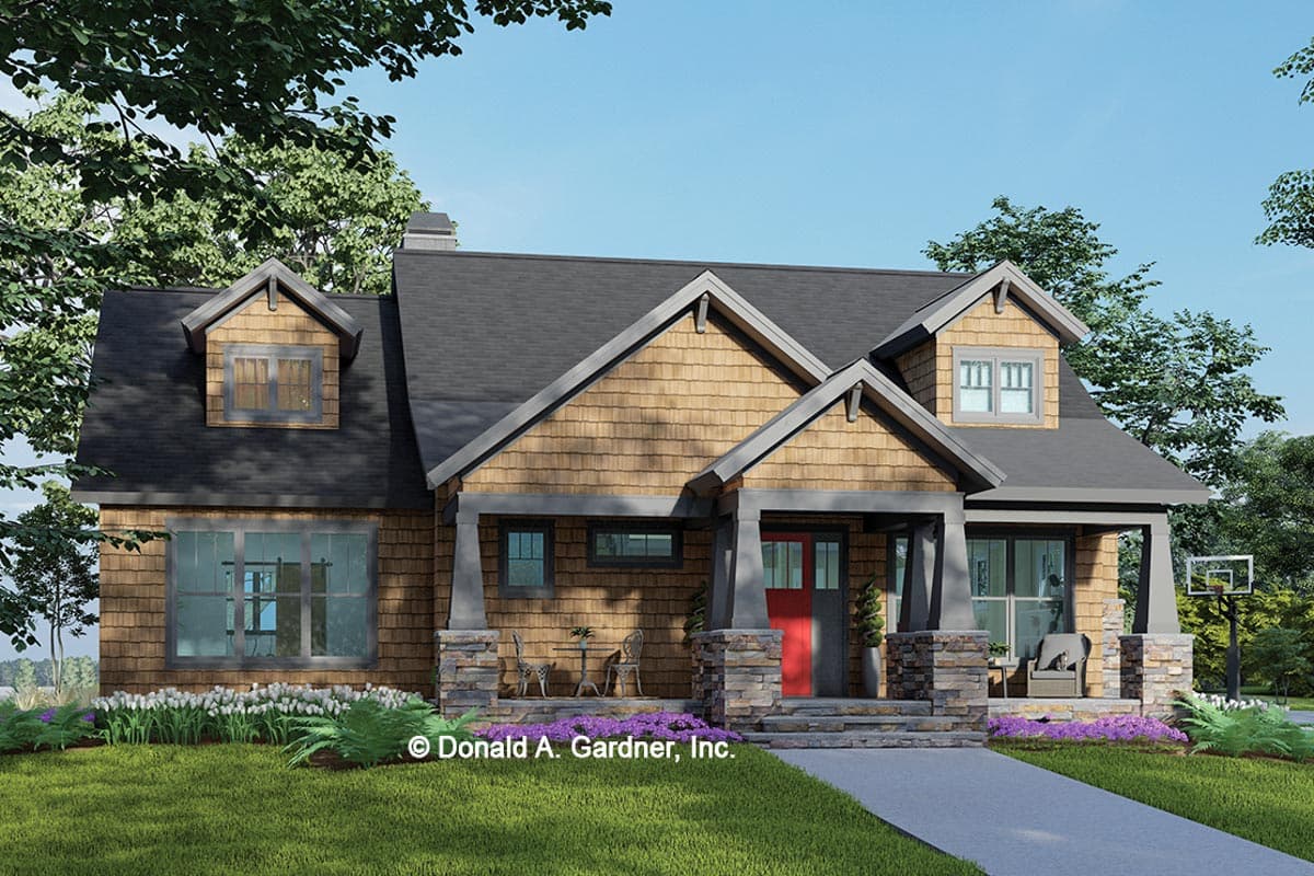 House plan exterior in Craftsman style, 1.5 stories, with prominent gables, stone accents, and a covered front porch with a red door.