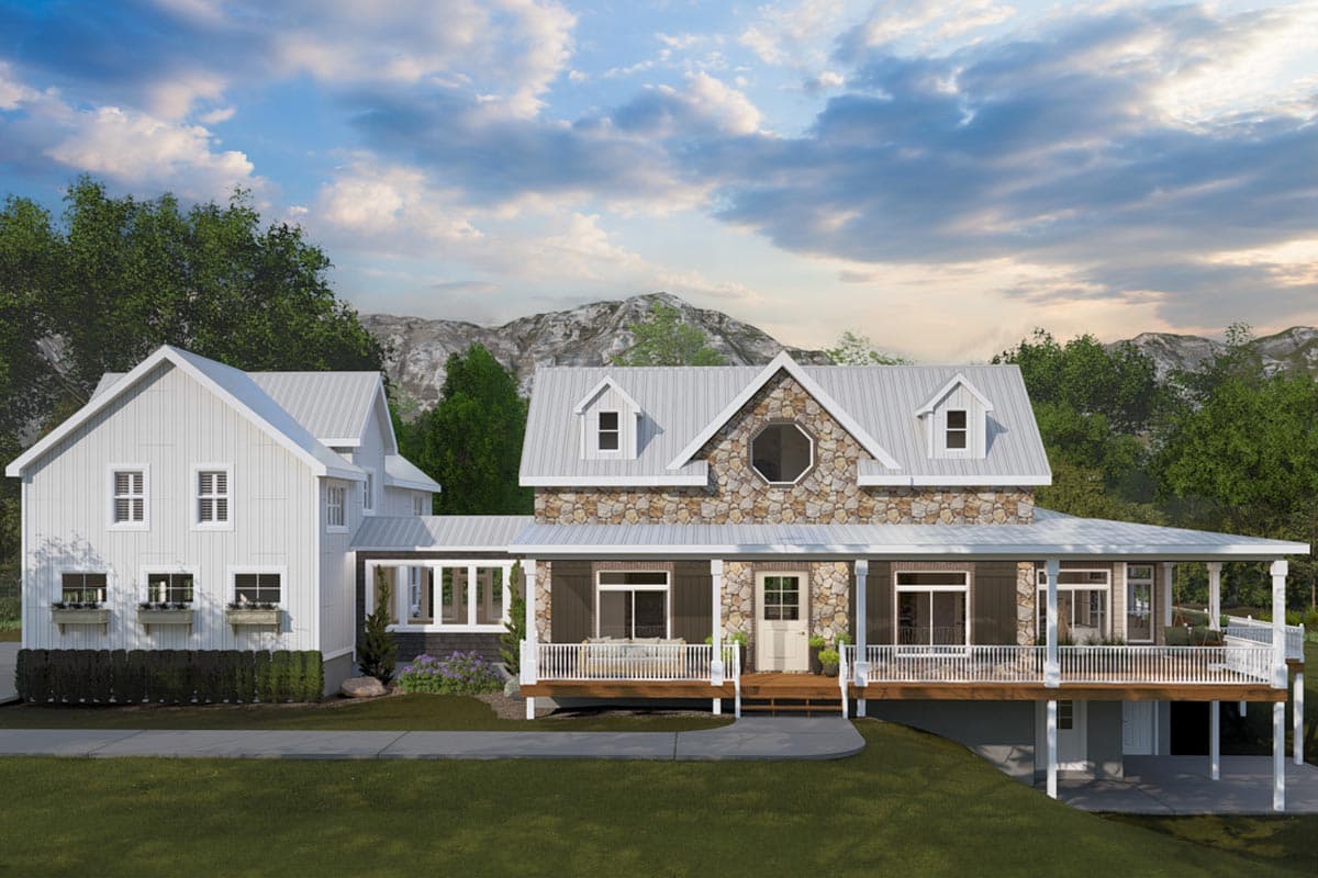 House plan exterior. Two-story home with a wraparound porch, gabled roof, and stone facade. Additional structure with matching roofline to the left.