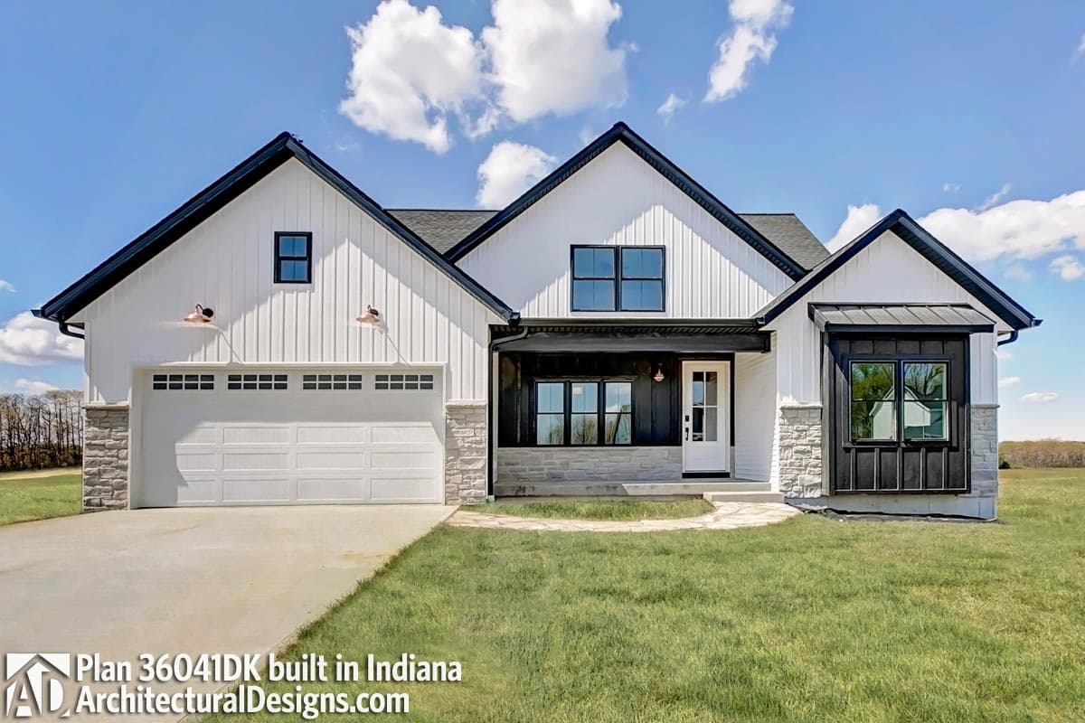 Modern Farmhouse house plan exterior with board and batten siding, stone accents, dual gables, and a side-facing garage.