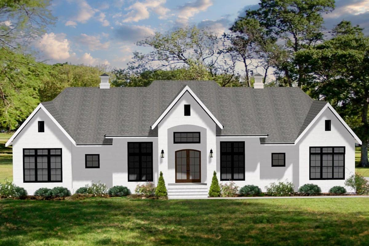 House plan exterior. Two-story Modern Farmhouse with gables, a covered entryway, and a central roofline dormer, featuring dark-framed windows.