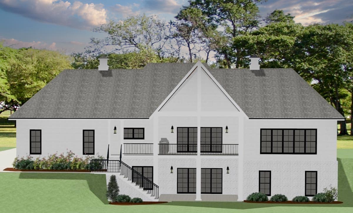 House plan exterior: Modern Farmhouse style, two stories, with a large gable over a covered balcony and brick lower level.