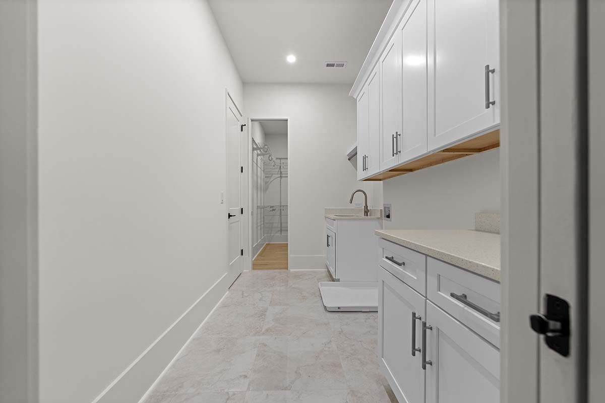 Plan 29930LDG: Transitional House Plan with 2-Story Living and 2 Laundry Rooms - 5215 Sq Ft - Image #11 - New American, Transitional