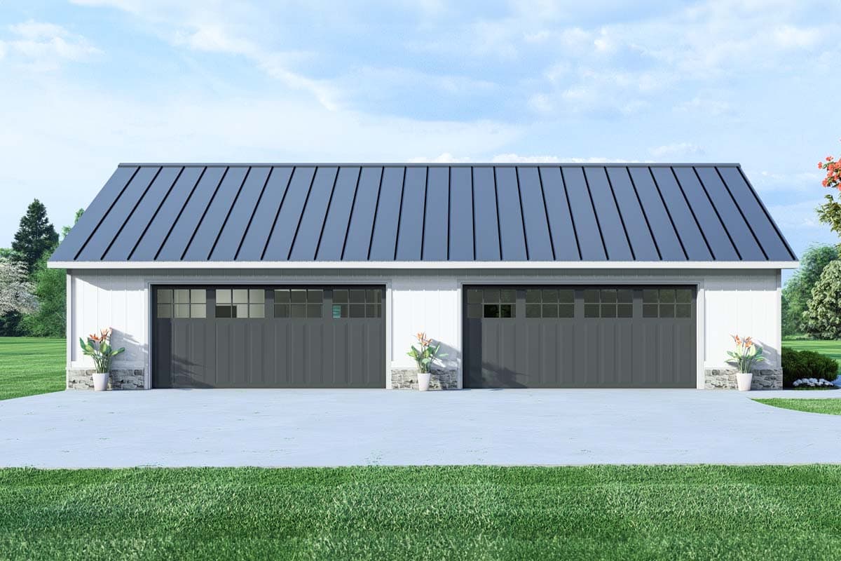 Modern Farmhouse style two-car garage with metal gambrel roof, white siding, and stone accents.