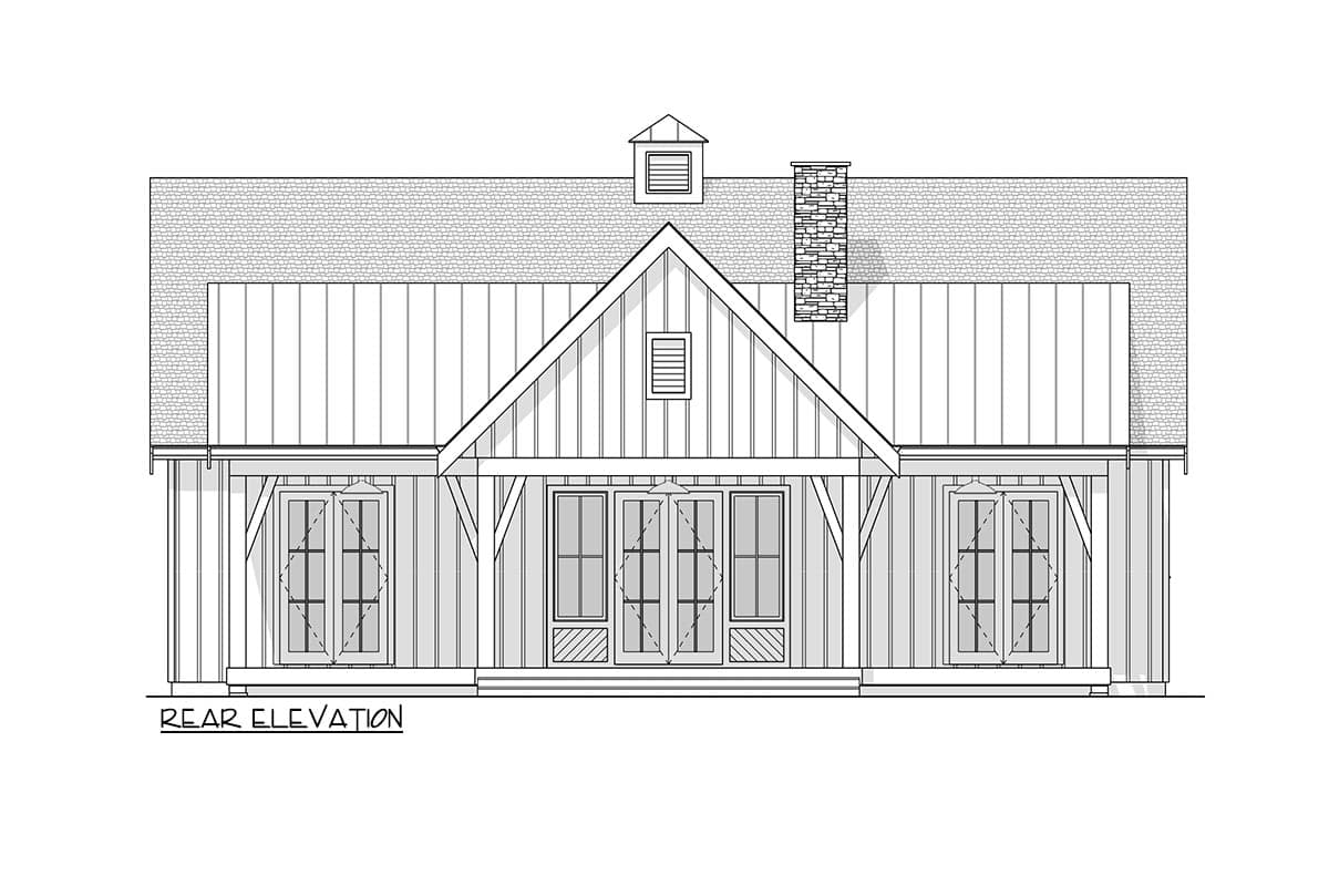 A rear elevation of a house with a gabled roof, centered entry with double doors, and a stone chimney stack on the roof.