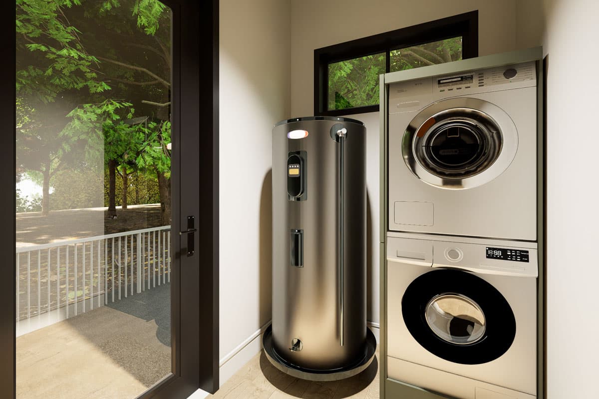 Interior view of a laundry room with stacked washer and dryer, water heater, and door to an outdoor patio.