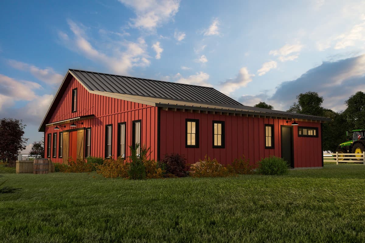 Red barn-style house plan exterior with metal roof, gambrel gable, double barn doors, and multiple windows.