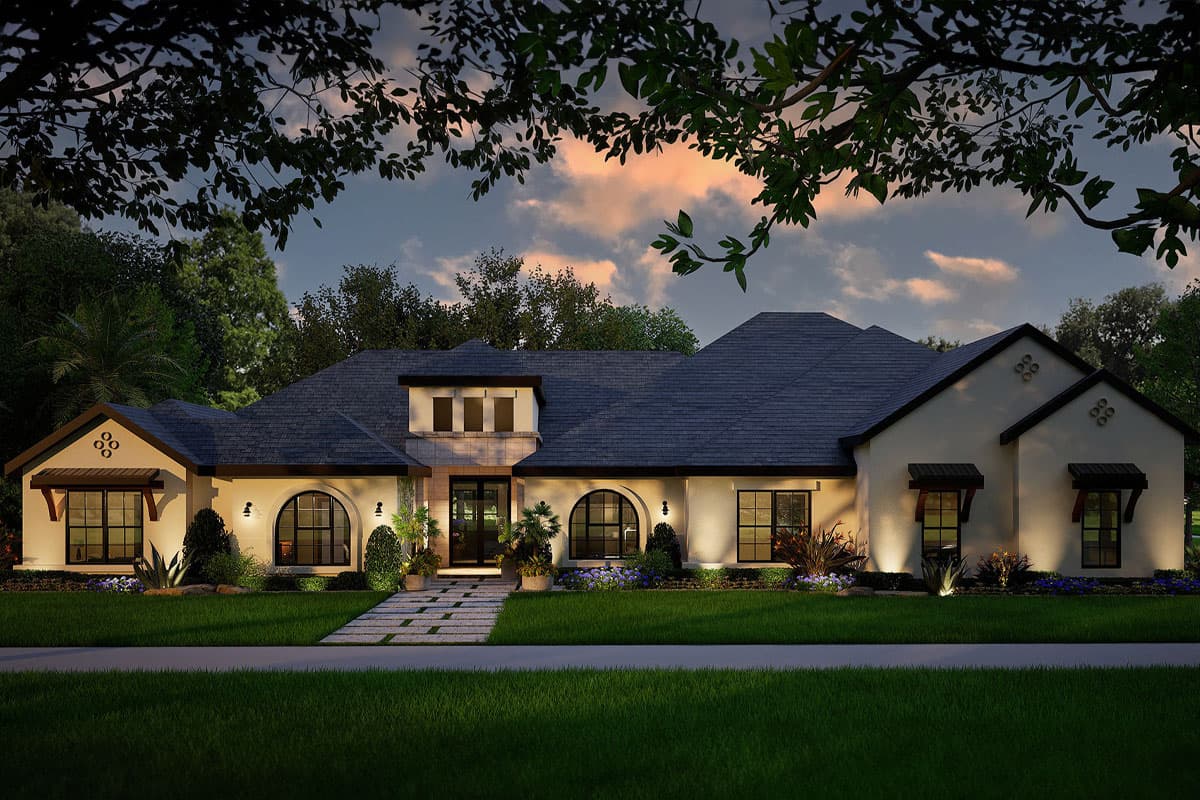 House plan exterior: Ranch style, one story, with stone accents, arched windows, and a covered entry.