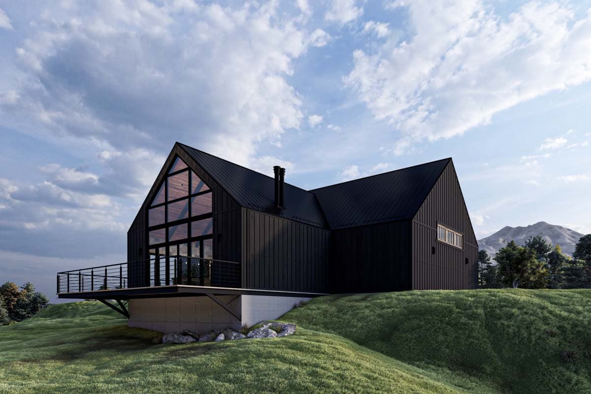 House plan exterior with modern style, two stories, gable roof, expansive glazing, and a deck. Set on a grassy hill with mountain views.