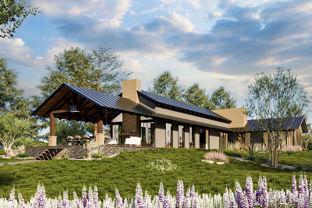 Modern house plan exterior with expansive covered patio, stone chimney, and large windows.