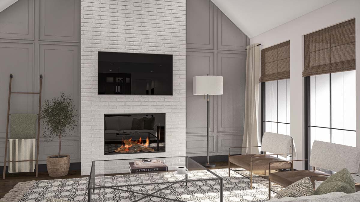 Living room interior with vaulted ceiling, white brick fireplace, modern furniture, and large windows.