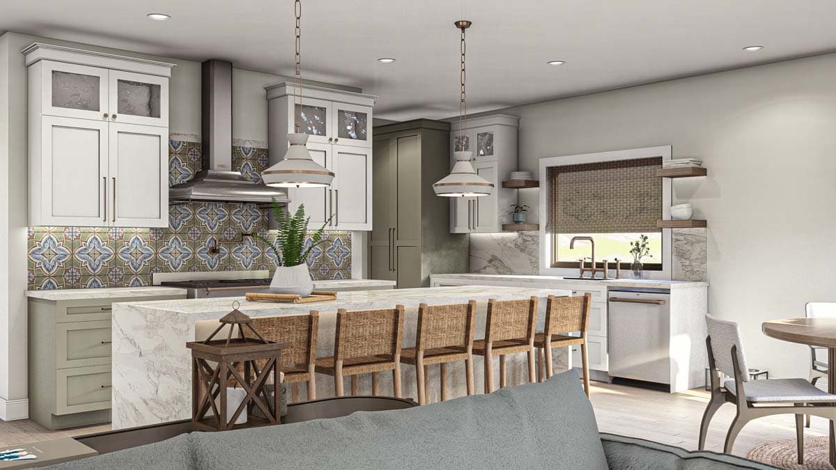 Kitchen with large island, bar seating, white cabinets, patterned backsplash, stainless steel appliances, and pendant lighting.