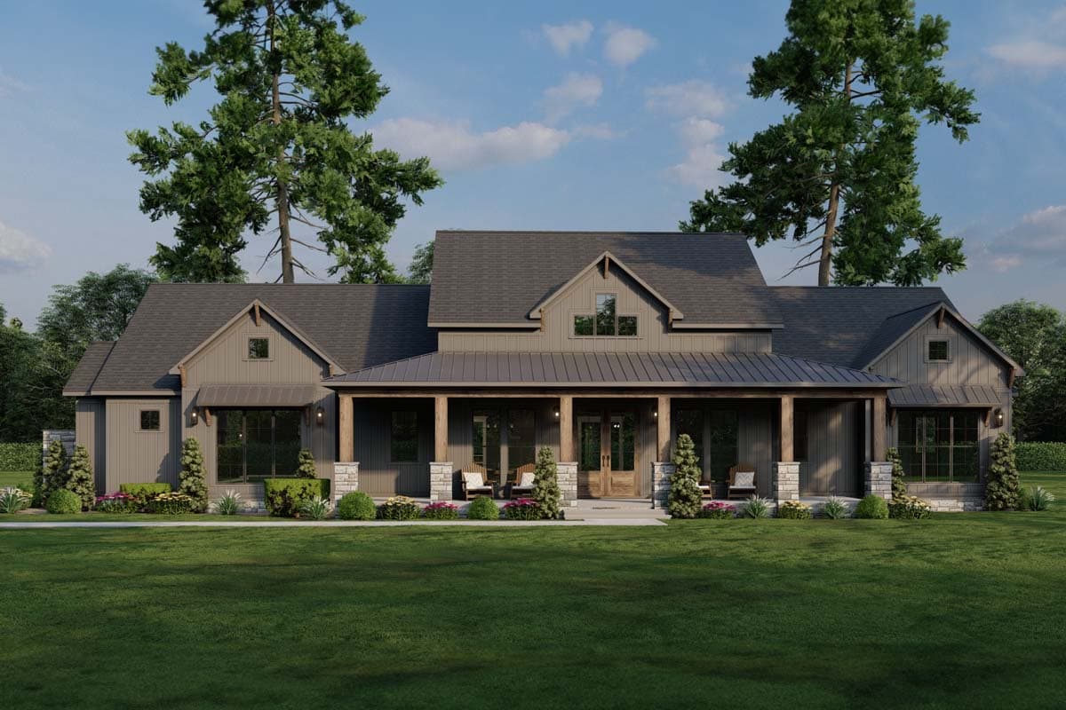 Modern Farmhouse house plan exterior with a deep covered porch, stone column bases, gables, and board and batten siding.