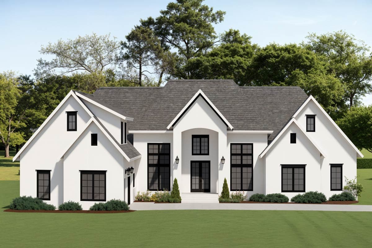 House plan exterior: Modern Farmhouse style, two stories, central arched entryway, prominent gables, and side-facing garage.