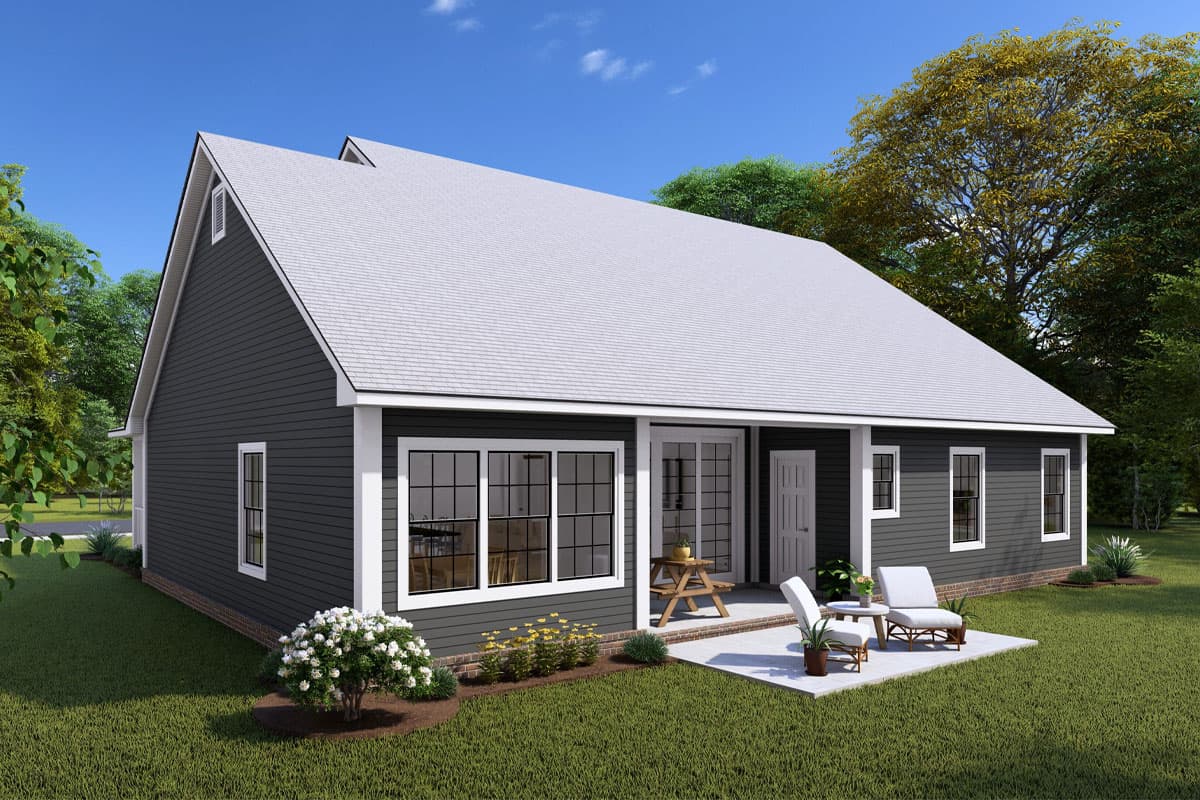 House plan exterior: Ranch style, single story, featuring a prominent gable and wide windows. Includes patio and backyard.