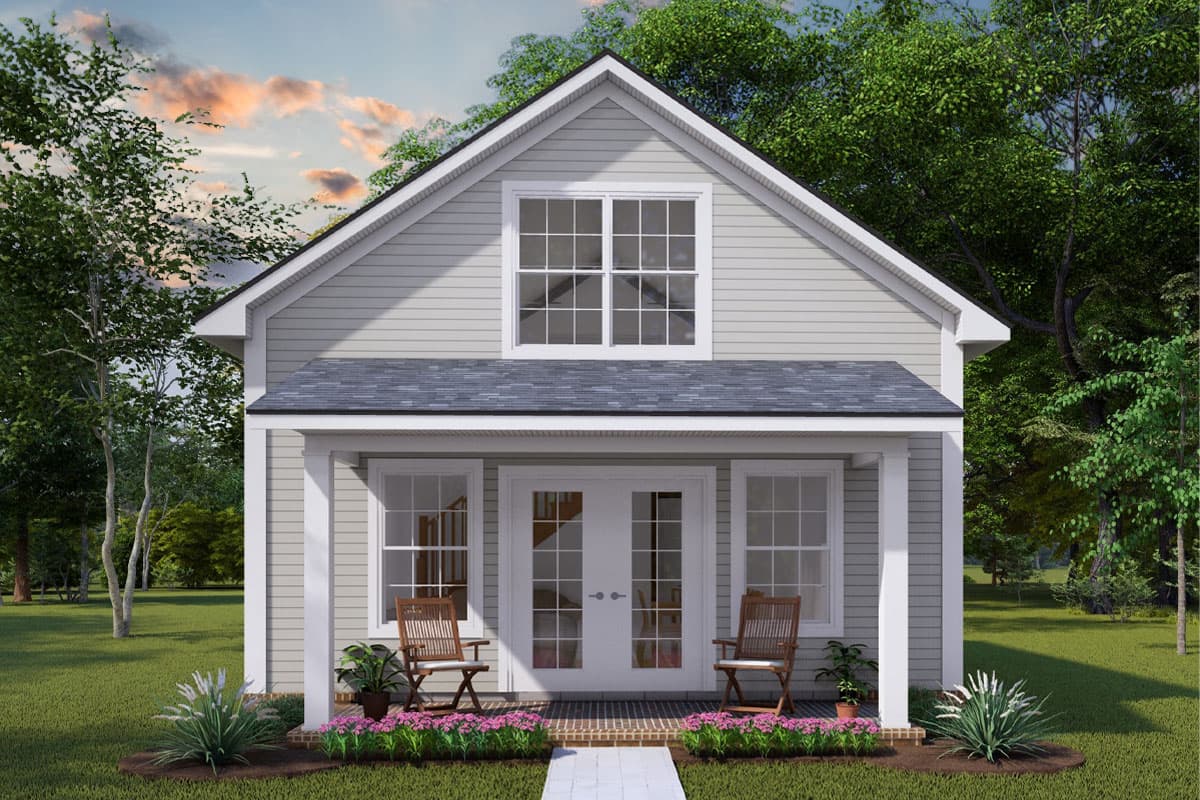 House plan exterior. Two-story cottage style. Features include front porch, gabled roof, and dormer window above the entry doors.