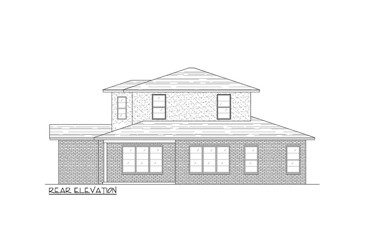 Rear elevation of a two-story house plan with brick exterior, multiple gables, and numerous windows.