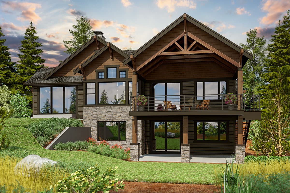 House plan exterior: Modern mountain style, two stories, stone accents, prominent gables with exposed rafter tails, and a covered upper-level deck.