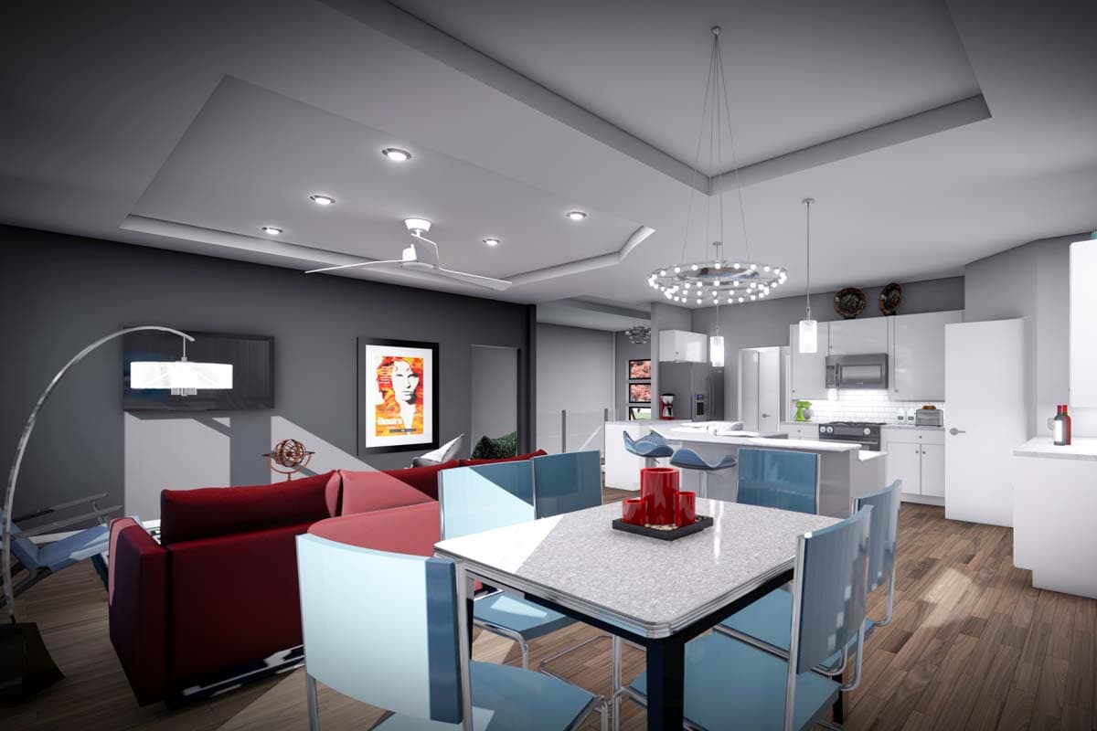 Open concept living, dining, and kitchen area with a tiered ceiling, modern light fixtures, and a large island.