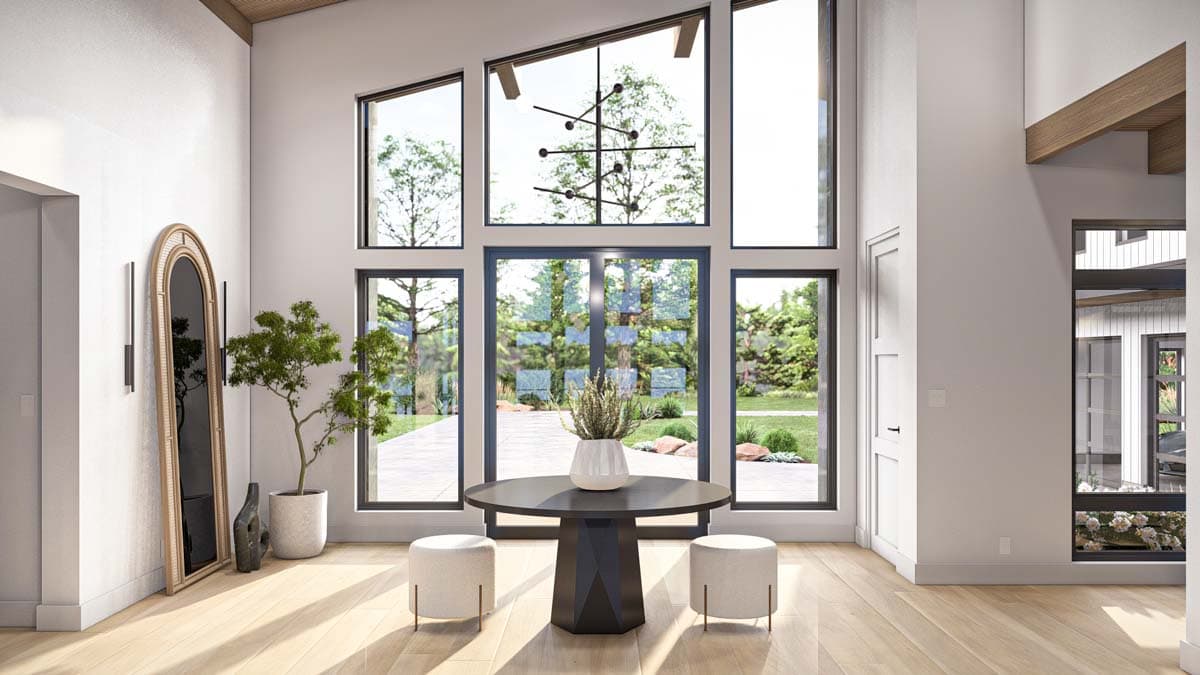 Interior rendering of a modern entryway with a vaulted ceiling, large angular windows, and wood beams.