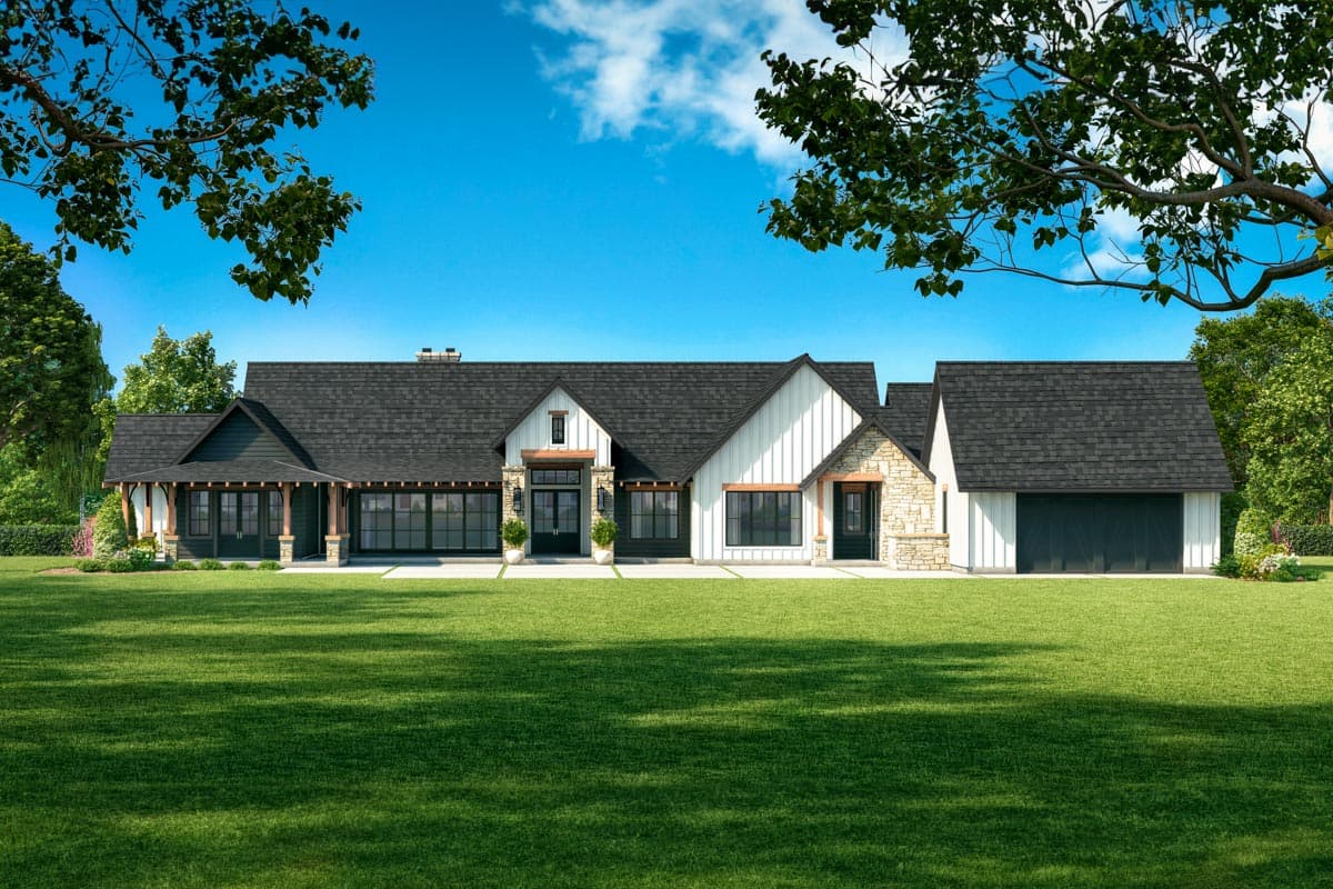 Modern Farmhouse house plan exterior with dark gable roofs, stone accents, covered porch, and attached garage.