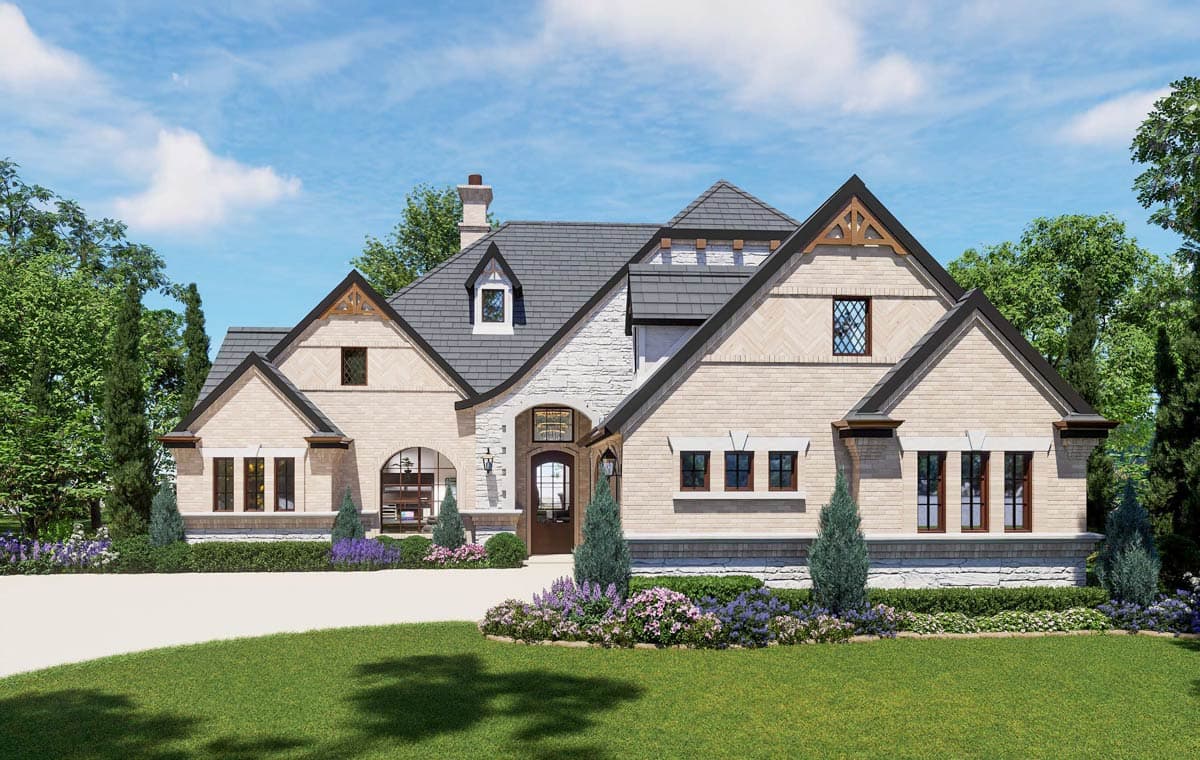 House plan exterior: Tudor style, multiple gables with decorative timber, stone accents, and arched entry.