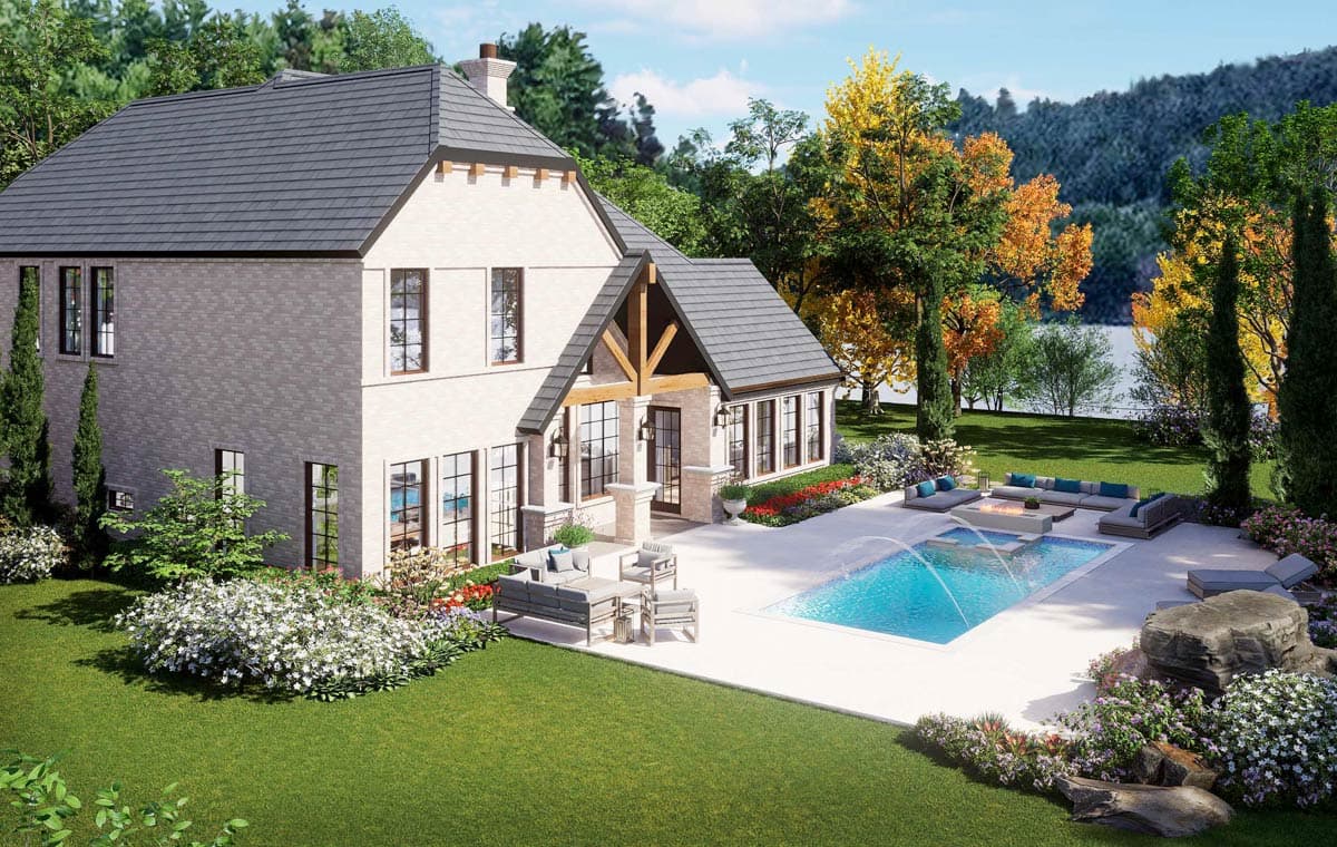 House plan exterior: Two-story brick home with gabled entry, large windows, and a swimming pool.