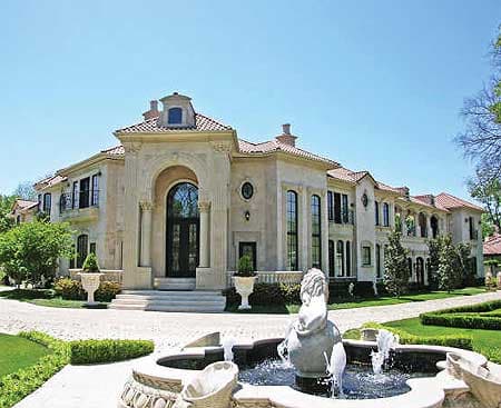 House plan exterior: Italian Renaissance style, multiple stories, arched entryway, red tile roof, and balconies.