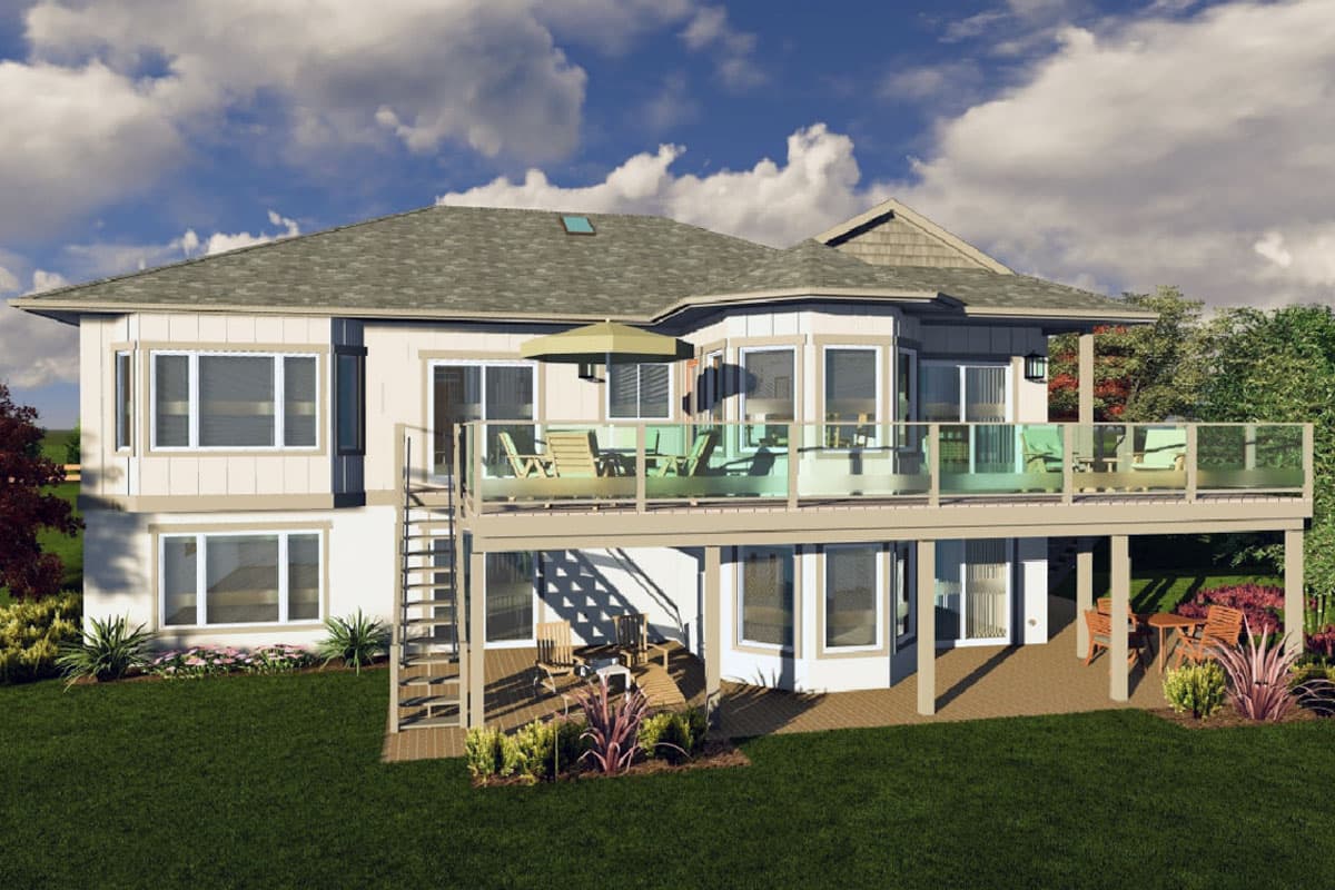 House plan exterior: two-story home with large upper deck featuring glass railings, lower patio, and multiple bay windows.