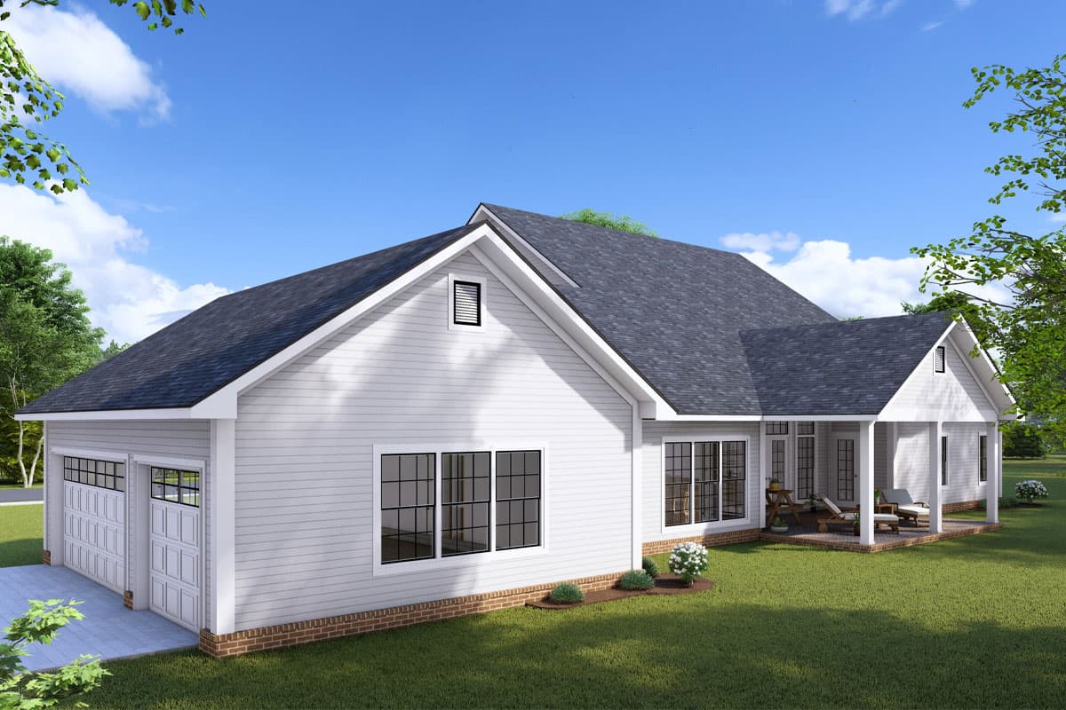 House plan exterior: Ranch style, white siding, two-car garage with carriage doors, covered rear porch, and gabled dormers.