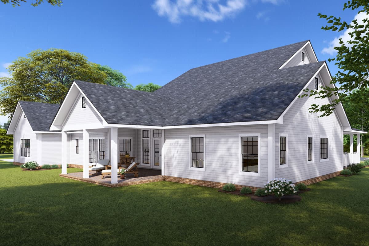 Modern farmhouse house plan exterior with covered porch, multiple gables, and clapboard siding.