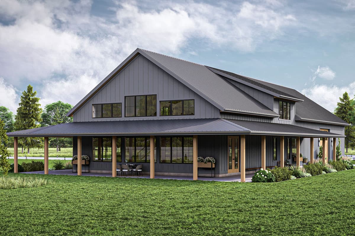 Modern Farmhouse house plan exterior with a broad wrap-around porch, metal roof, and numerous large windows.