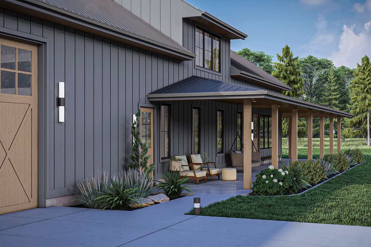 Modern Farmhouse house plan exterior with dark vertical siding, a covered porch with wood columns, and a large wood garage door.