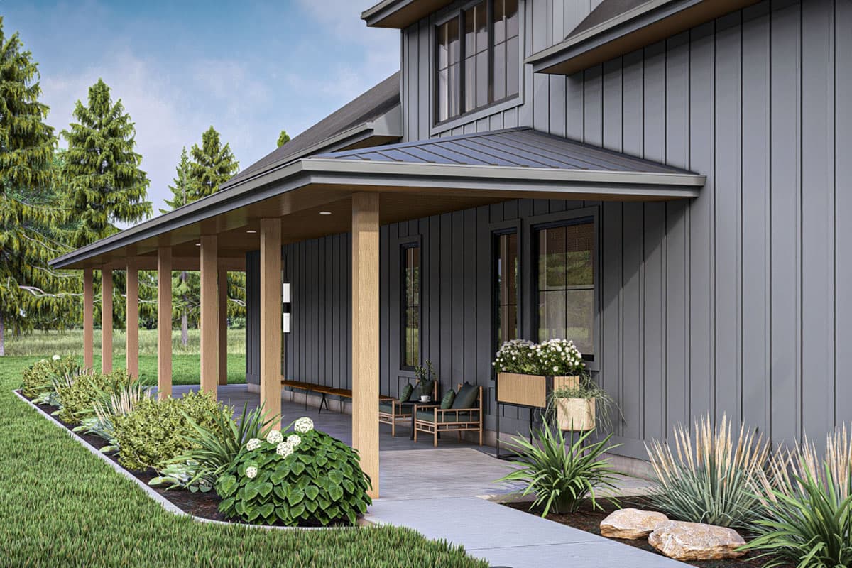 House plan exterior: Modern farmhouse style with a wraparound porch, vertical siding, and multiple gables.