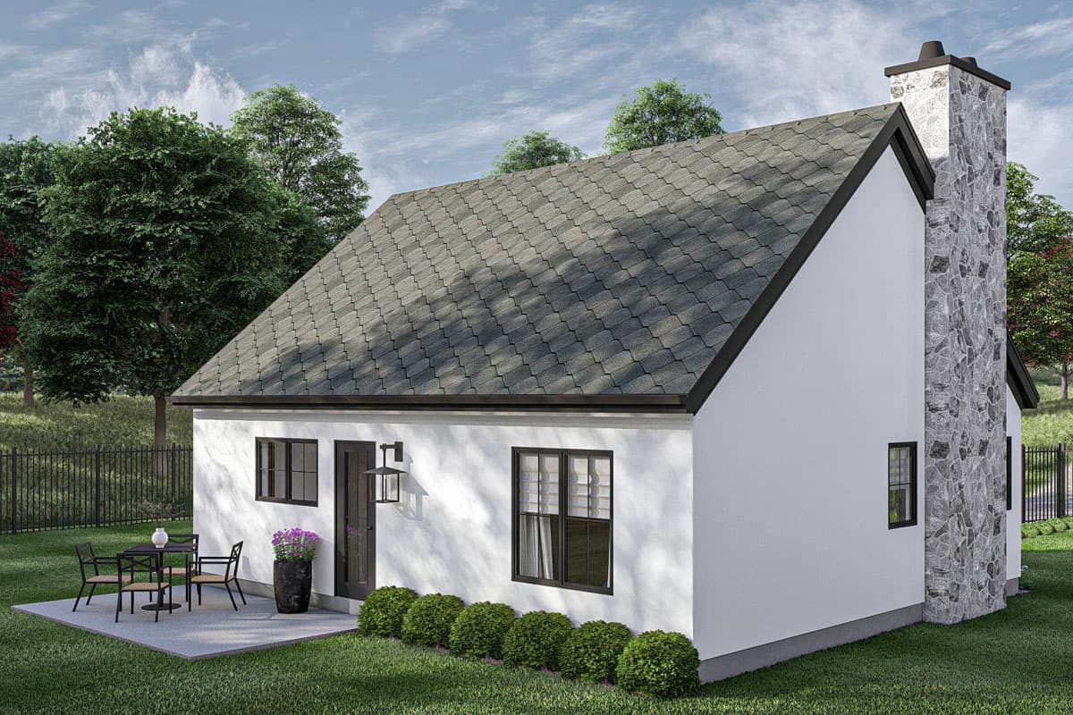 House plan exterior: One-story dwelling with a prominent stone chimney, asphalt shingle roof, and a small patio area.