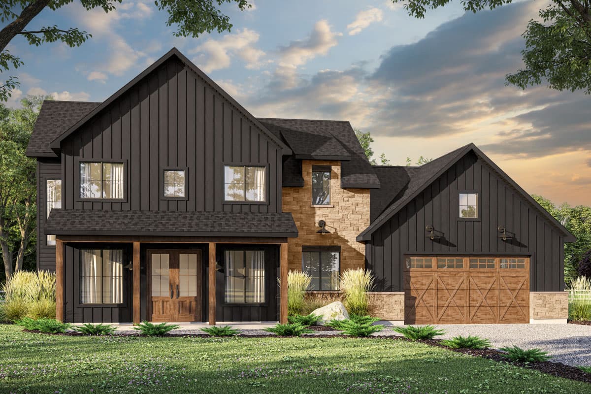 A modern farmhouse with black siding, stone accents, and a wooden garage door. Green lawn and landscaping in front of the two-story home.
