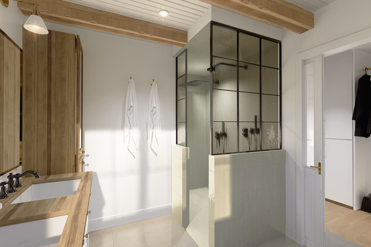 Modern bathroom with walk-in shower. Features a glass enclosure, white towels, wood beams, and a vanity. An open doorway leads to a closet.