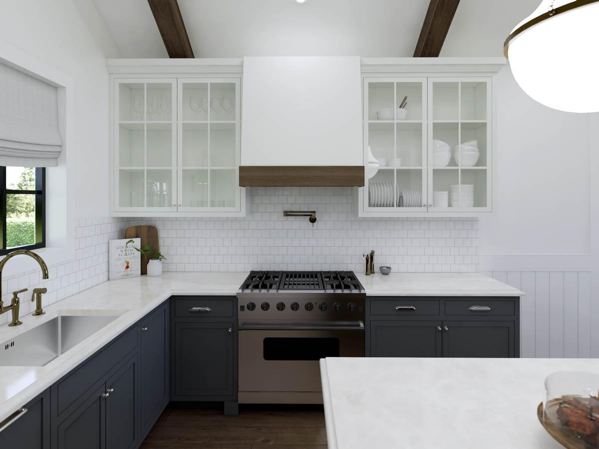 A modern kitchen with white tile backsplash, dark gray cabinets, and a stainless steel range. Glass-fronted cabinets and wood beams add warmth.